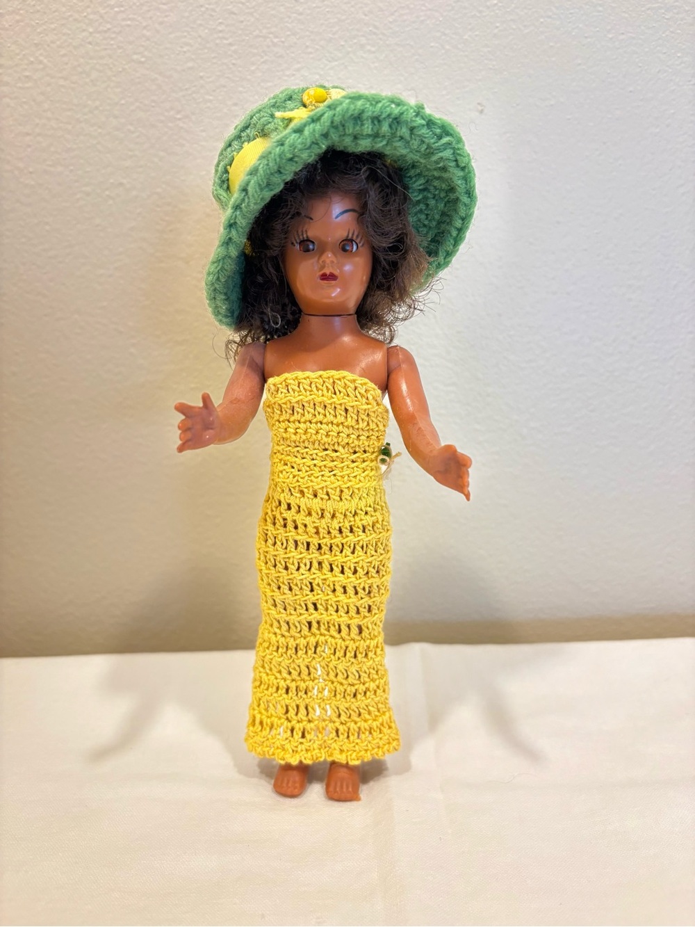 VTG 7 3/4” Black Doll W/Hand Crocheted Slinky Dress & Hat Afro Arms/Eyes Move